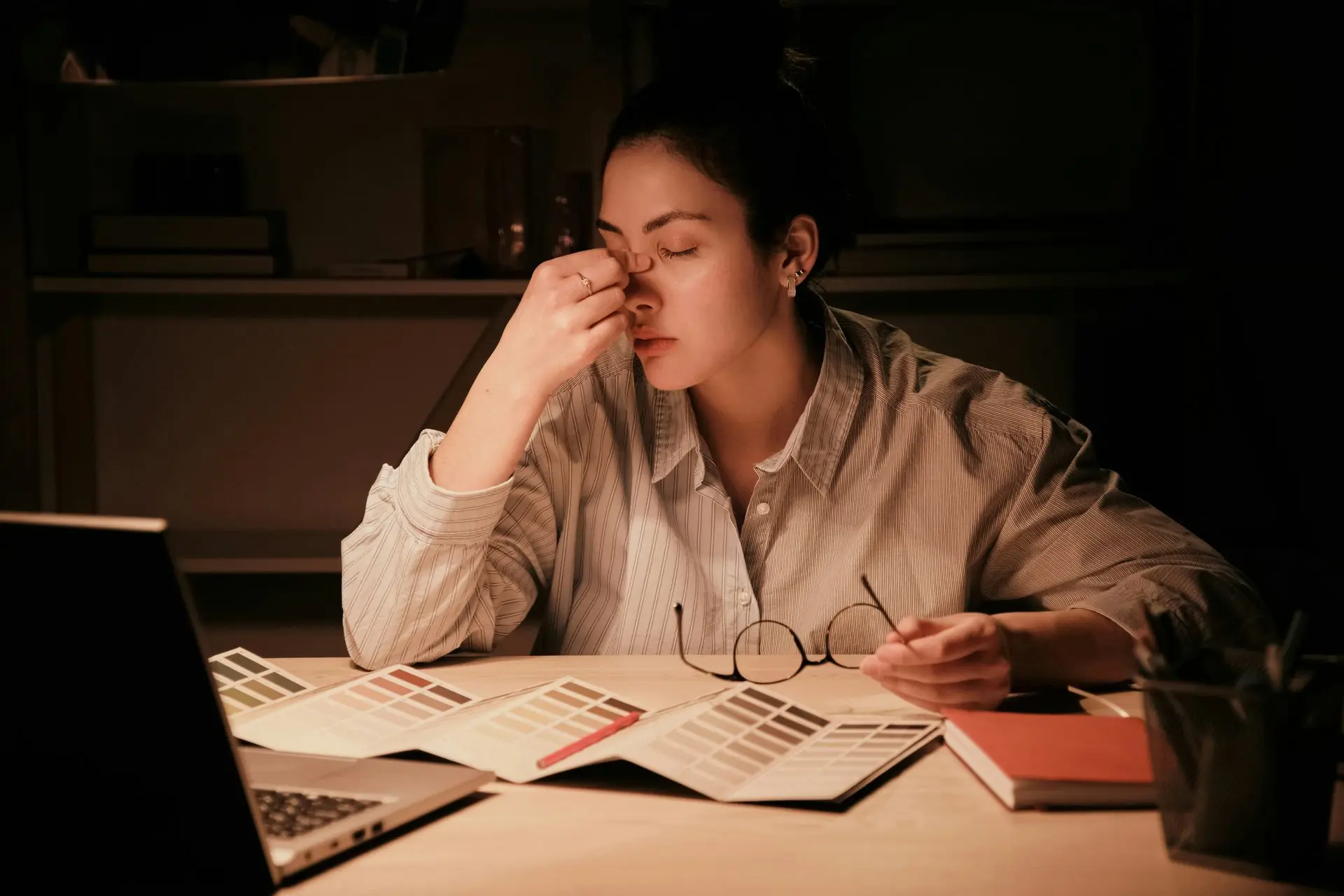 Tired woman working in office